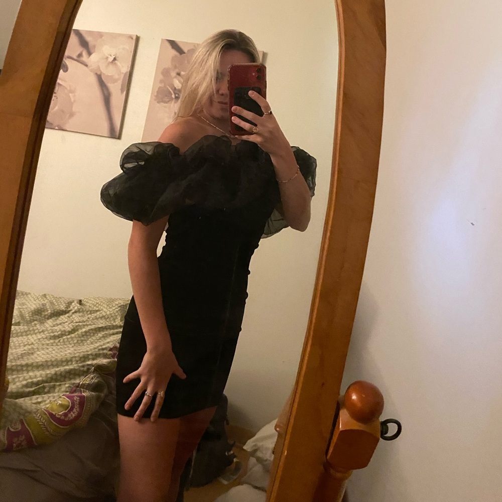 A black tight mini dress